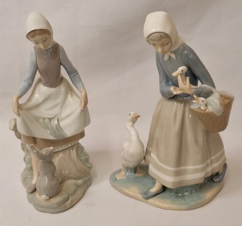 Lladro Figurine, girl wearing an apron with rabbit approx.