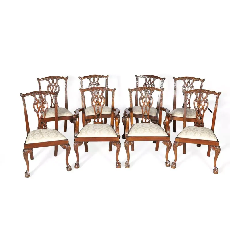 A Set Of Eight George III Style Mahogany Dining Chairs in the Chippendale manner, comprising two armchairs and six single chairs