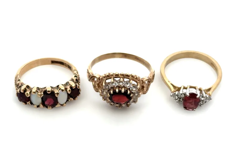 Three 9CT Gold and Garnet Rings