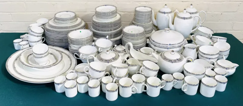 A large Wedgwood 'Amherst' pattern part dinner and part tea service to include dinner plates, oval platters, Teapot, coffee pots, cups, gravy boat, coffee cans