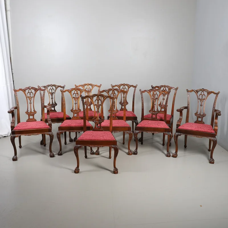 A Set of Ten 20th Century Carved Walnut Dining Chairs