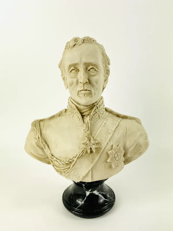 A composite bust sculpture of 'Arthur Wellesley', the 1st Duke of Wellington (1769-1852), mounted upon a circular marble socle