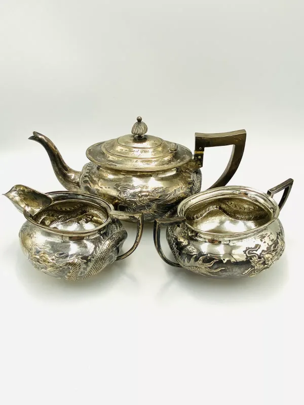 A late 19th century/early 20th century Chinese export silver three piece tea set