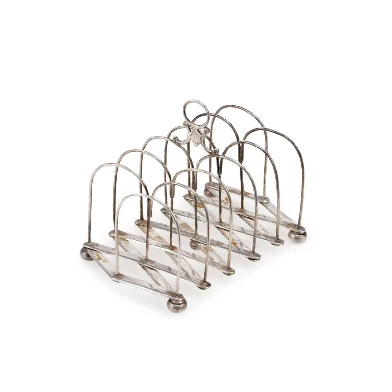 An Indian Colonial Silver Expanding Toast Rack by William Henry Twentyman, Calcutta, first quarter of the 19th Century, of six-division wirework form