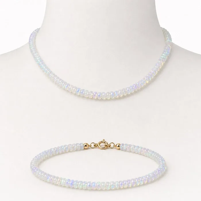 2 piece jewellery set - 18 kt. Yellow gold Opal