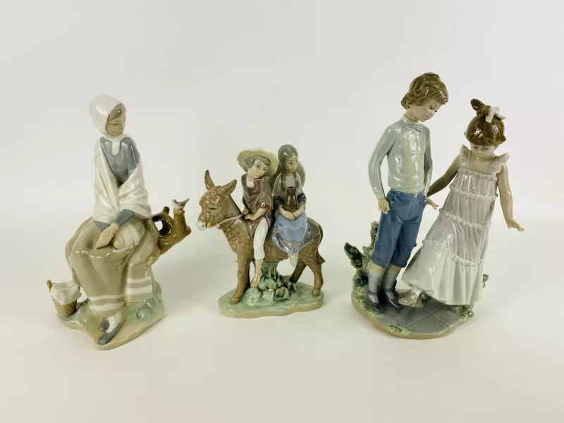 Three items to include a Lladro porcelain figurine 'One, Two, Three', model No.5426 (15.5cms wide x 12cms deep x 27cms high)