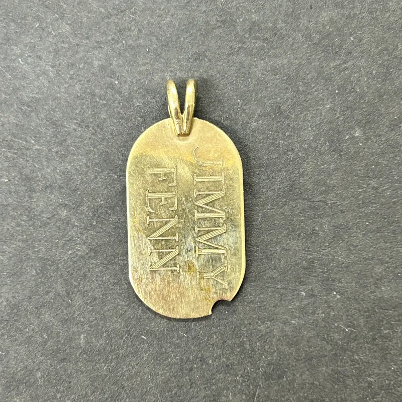A 9ct gold small engraved pendant, weight approx. 1.4g
