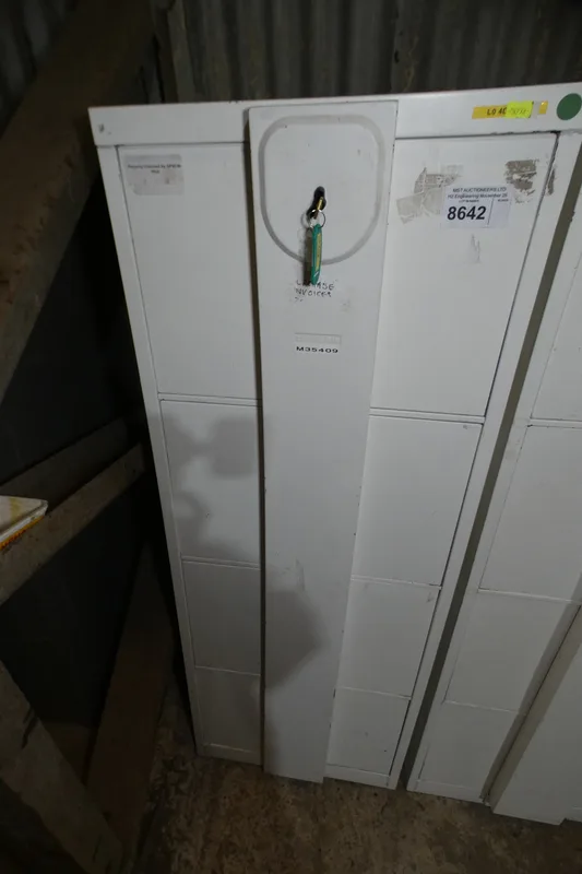 VAT 1 x White metal 4 Drawer filing cabinet with a lockable security bar