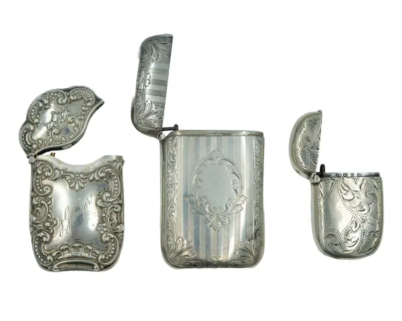 A trio of silver vesta cases