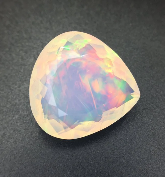 1 pcs Orange Opal - 11.26 ct - International Gemological Institute (IGI) - NATURAL COLOR PLAY OPAL