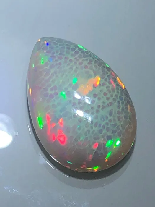 1 pcs White Opal - 55.49 ct - Asian Institute of Gemological Sciences (AIGS)