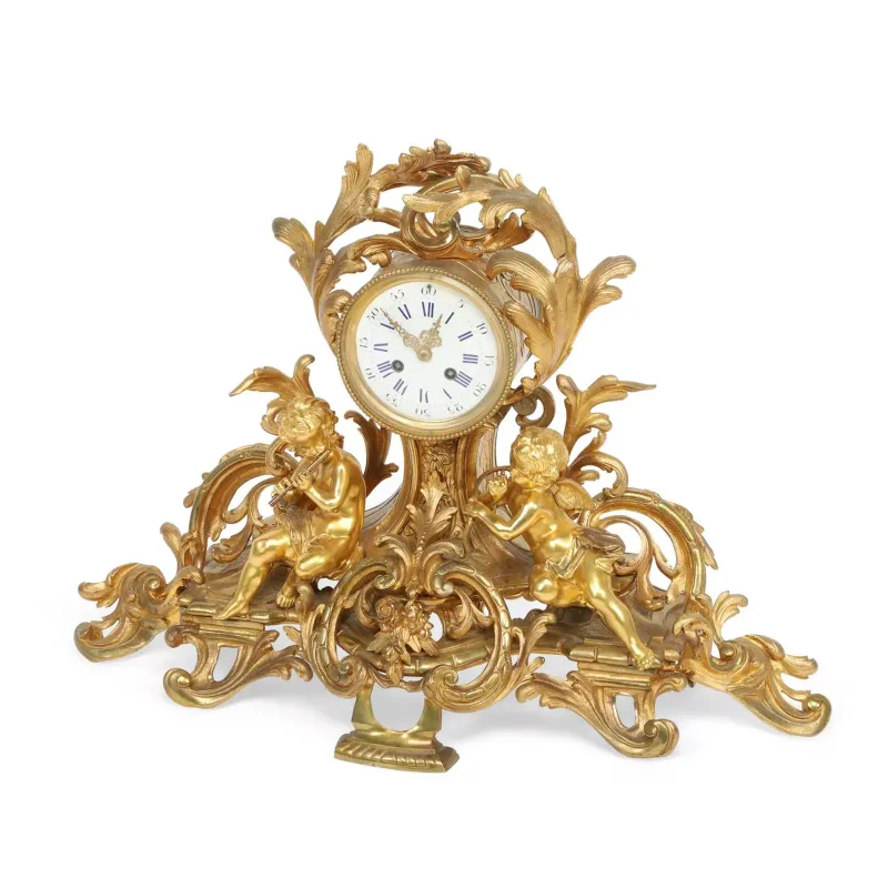 A French Gilt Bronze Figural Mantel Clock 19th Century, in the Louis XV taste