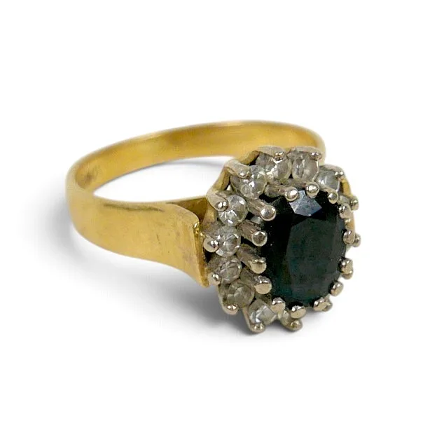 An 18CT Gold Sapphire and Diamond Cluster Ring
