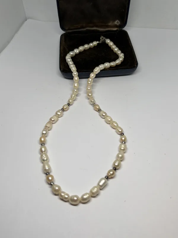A Pearl Necklace with Silver Clasp in a Presentation Box