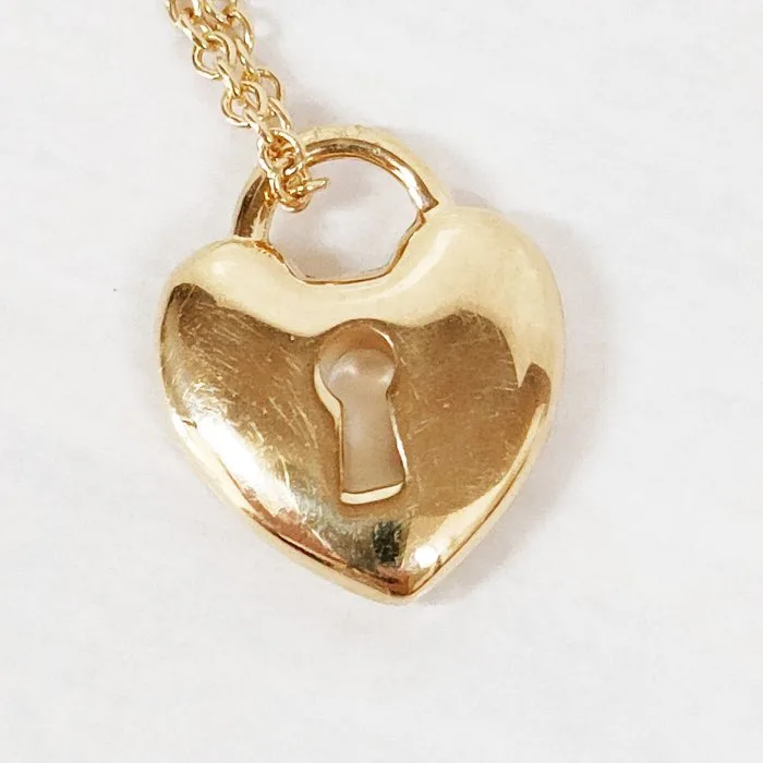 Tiffany & Co. - Necklace with pendant - 18 kt. Yellow gold - heart lock