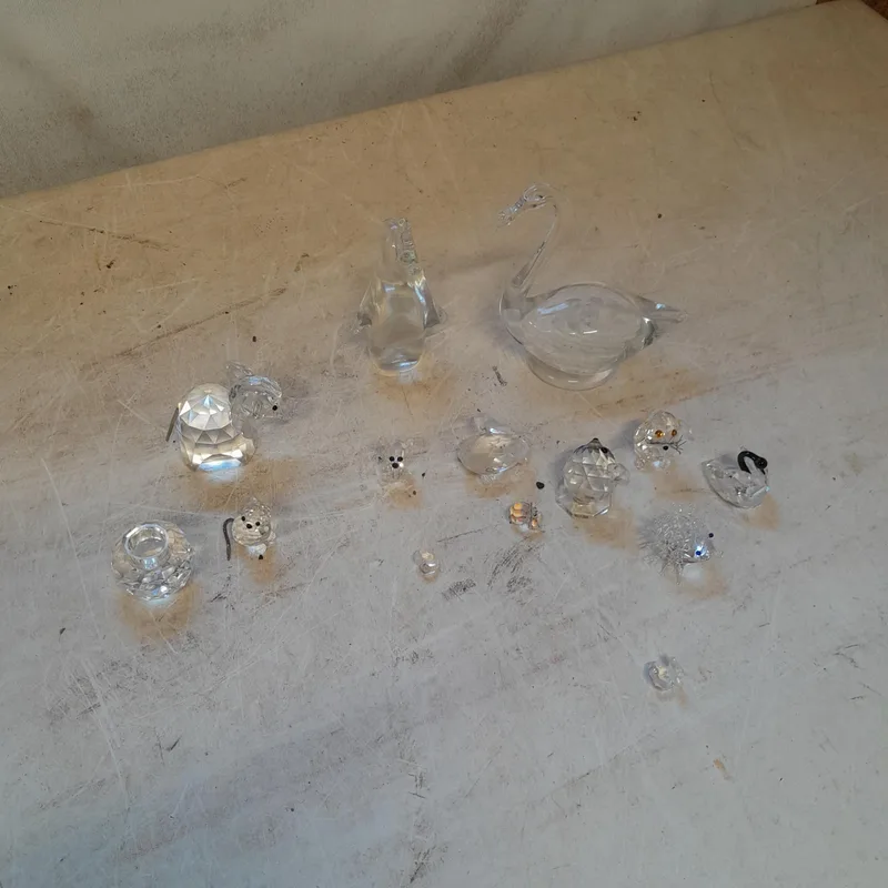 An array of cut glass animal ornaments including 3 x Swarovski
