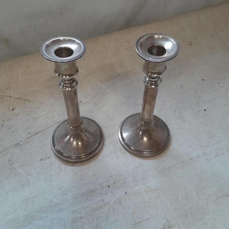 Pair of filled silver candlesticks, marks slightly rubbed Birm. 1911 William Neale gross weight 622 g