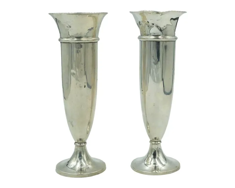 A pair of silver trumpet vases by Ollivant & Botsford