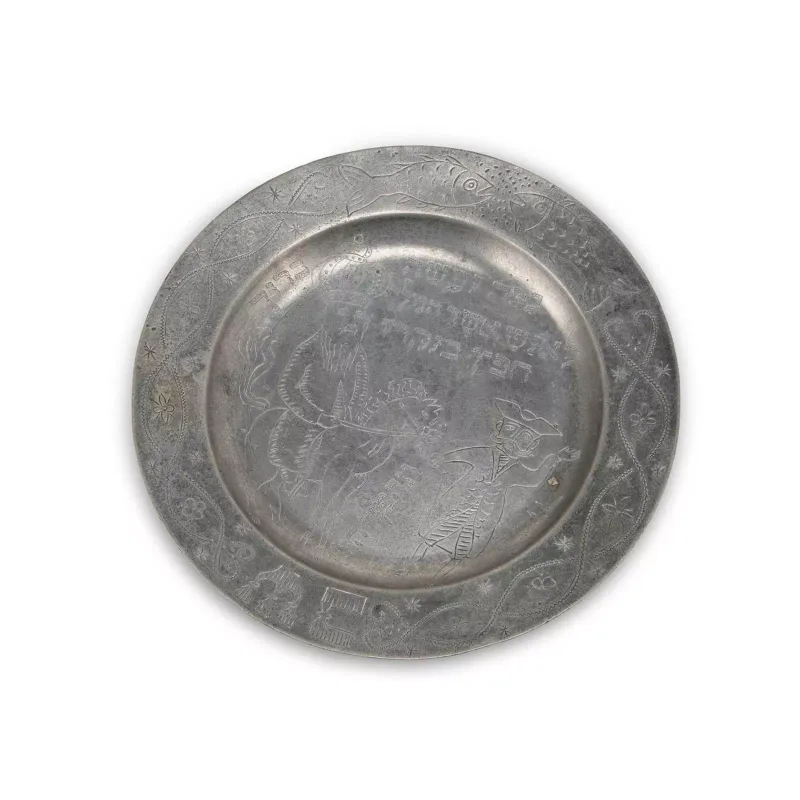 Judaica: An English Pewter 'Purim' Passover Plate 18th Century, centrally engraved with a king on horseback with an attendant, with Hebrew inscription