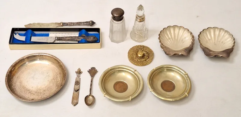 Pair Silver Plated Butter Shells with glass liners with silver handle, military style circular paperweight, silver handled cheese knife in box