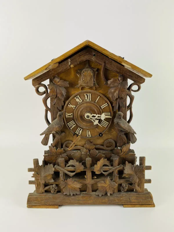 An early 20th century Black forest cuckoo mantle clock, of typical style and form