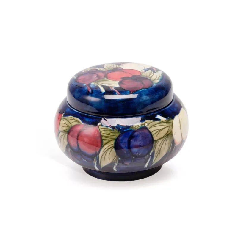 A Moorcroft 'Wisteria Plum' Jar And A Vase comprising the jar of compressed globular form with a screw-fitting cover