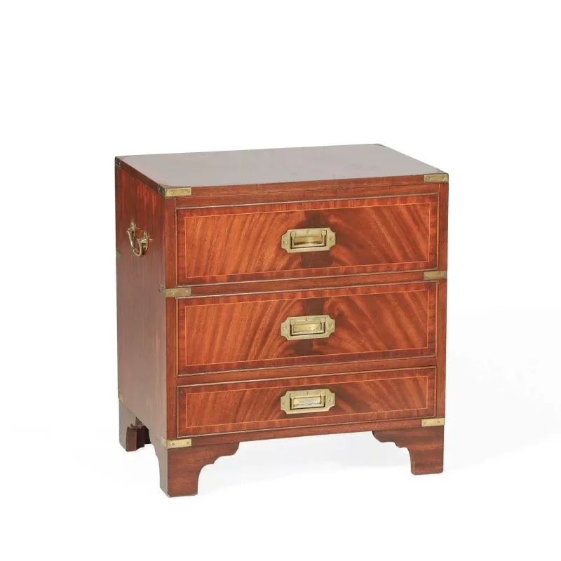 A Brass Mounted Mahogany Cellarette in the campaign taste, the hinged top above two dummy drawer fronts, with flush brass handles and corner mounts
