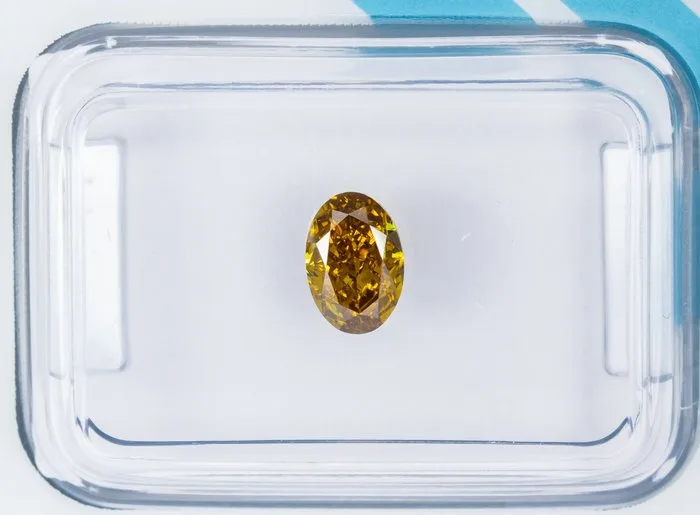1 pcs Diamond (Natural coloured) - 0.63 ct - Oval - Fancy intense Greenish, Brownish Yellow - VVS2 - International Gemological Institute (IGI)