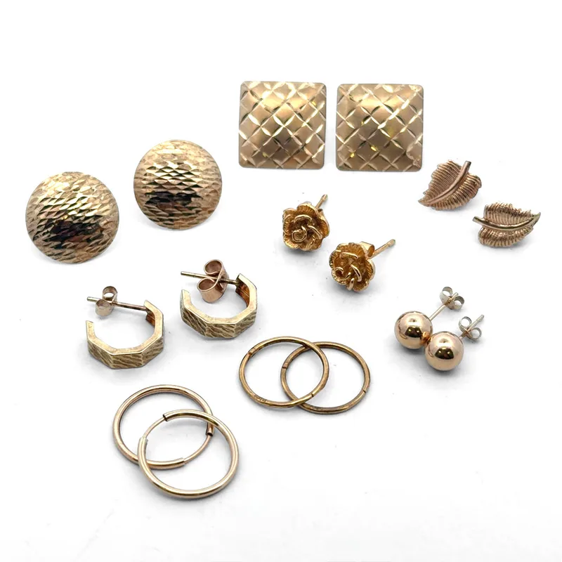 Eight Pairs of Gold/ Yellow Metal Earrings