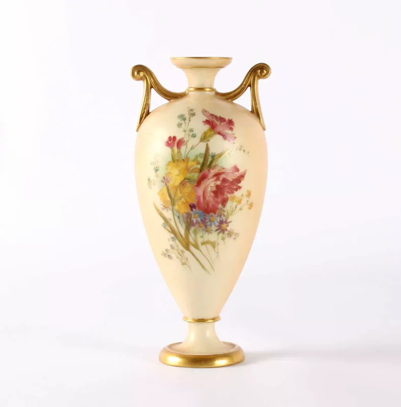 Royal Worcester, England A Blush Ivory Twin-Handled Urn A Blush Ivory Twin-Handled Urn by Royal Worcester, England