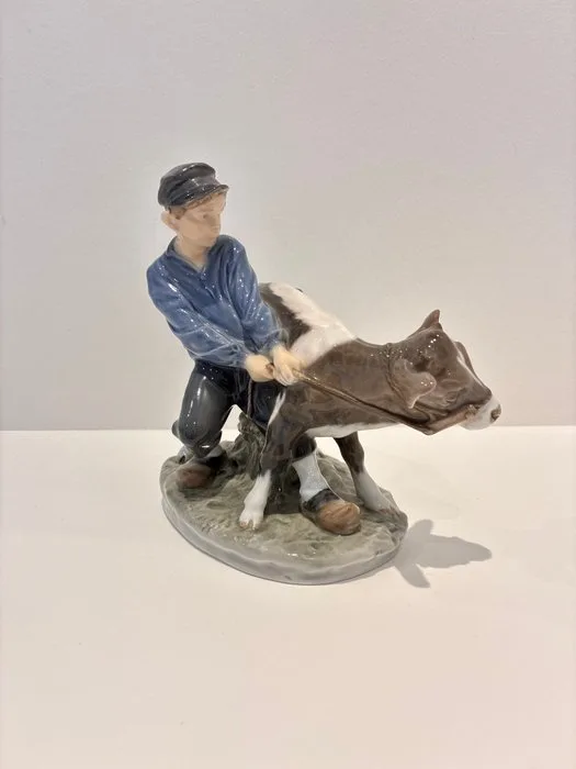 Royal Copenhagen - Christian Thomsen - Figure - Vintage Royal Copenhagen Porcelain Figurine – "Boy with Calf" #772 by Christian Thomsen - Porcelain