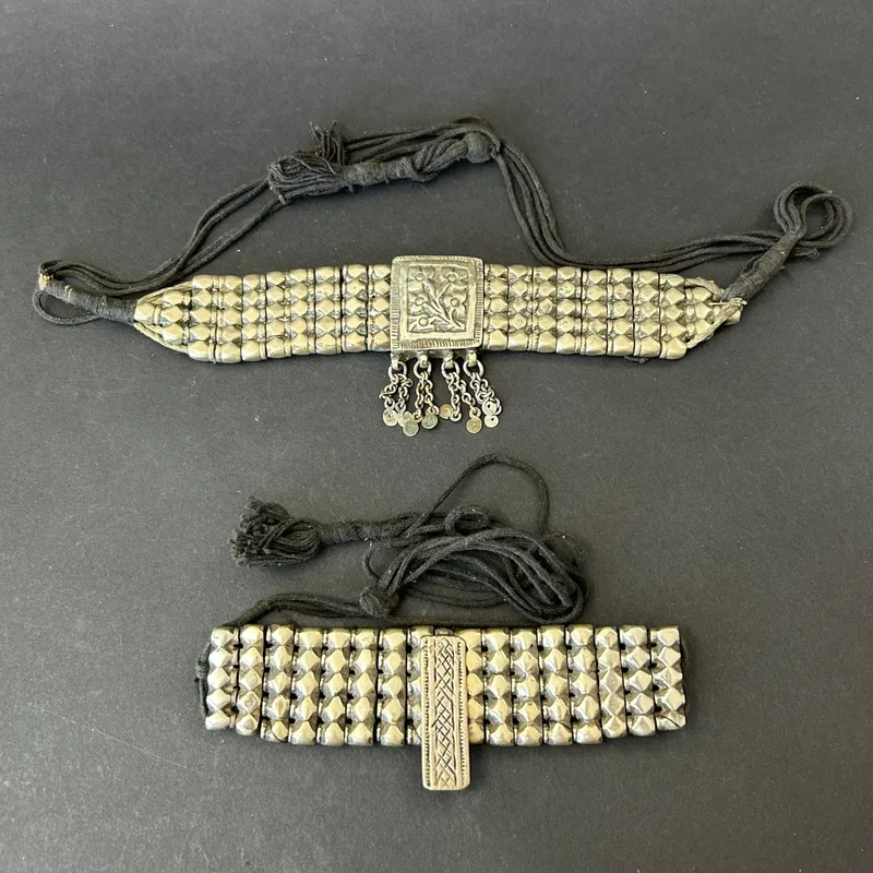 Two vintage Asian white metal chokers, the largest (the metal), approx. 7" long