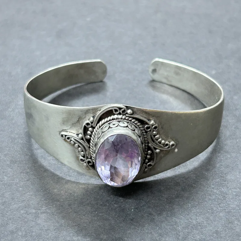A 925 sterling silver and amethyst style stone set bangle, weight approx. 35g