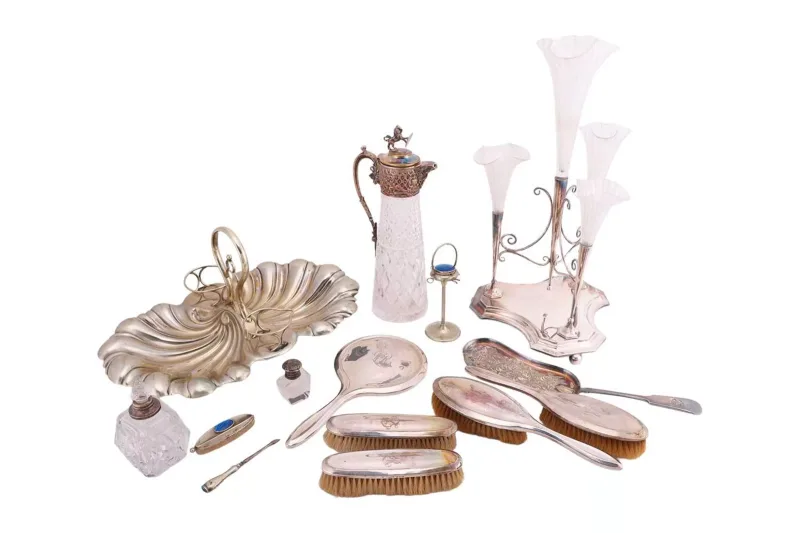 A silver backed dressing table set by S Blanckensee & Son Ltd, Birmingham 1919, comprising a hand mirror, hair brushes