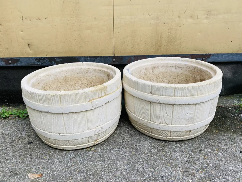 A pair of coopered barrel style garden planters. 42cms diameter x 26.5cms high