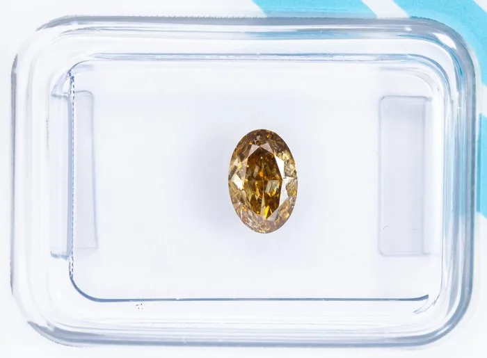 1 pcs Diamond (Natural coloured) - 0.61 ct - Oval - Fancy intense Yellowish Brown - SI2 - International Gemological Institute (IGI)