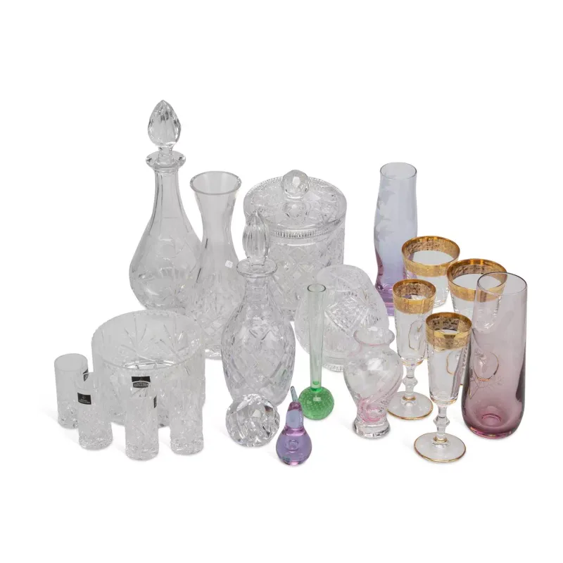 A Collection Of Cut And Coloured Glass including Tyrone Crystal, Edinburgh Crystal and Royal Doulton, comprising two decanters, a biscuit barrel and cover