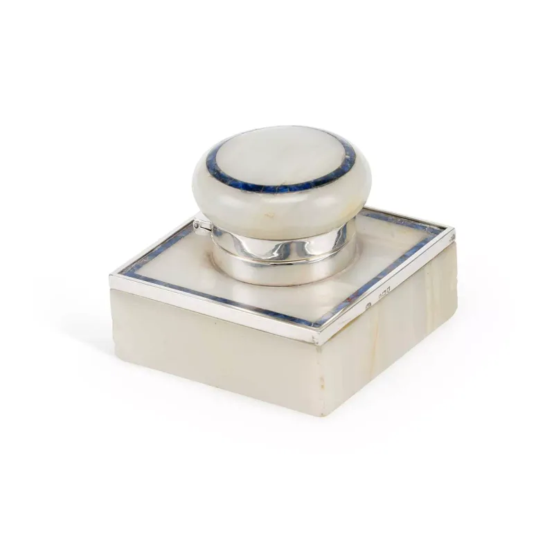 A George V Art Deco Silver Mounted Onyx And Stone Inkwell by George Betjemann & Sons, London 1913, of square form with a hinged cover