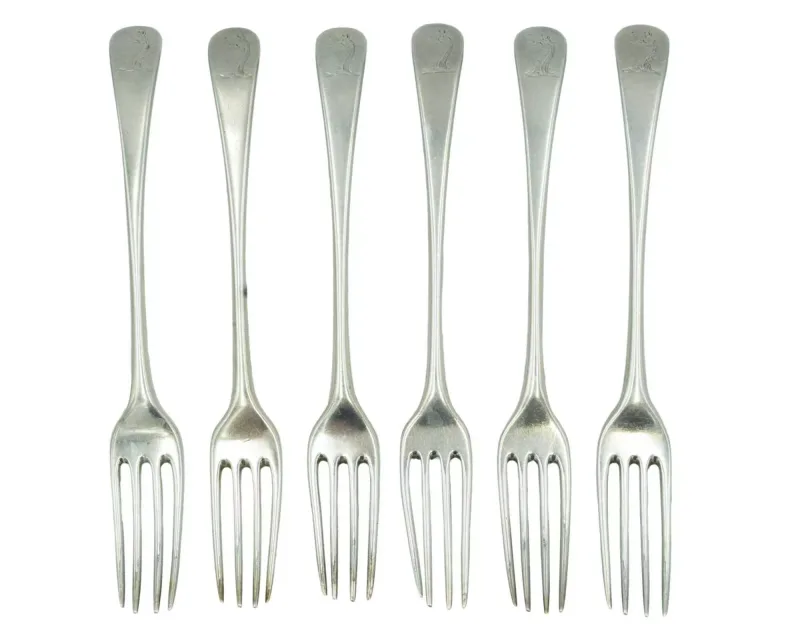 A set of six George III silver Old English pattern table forks