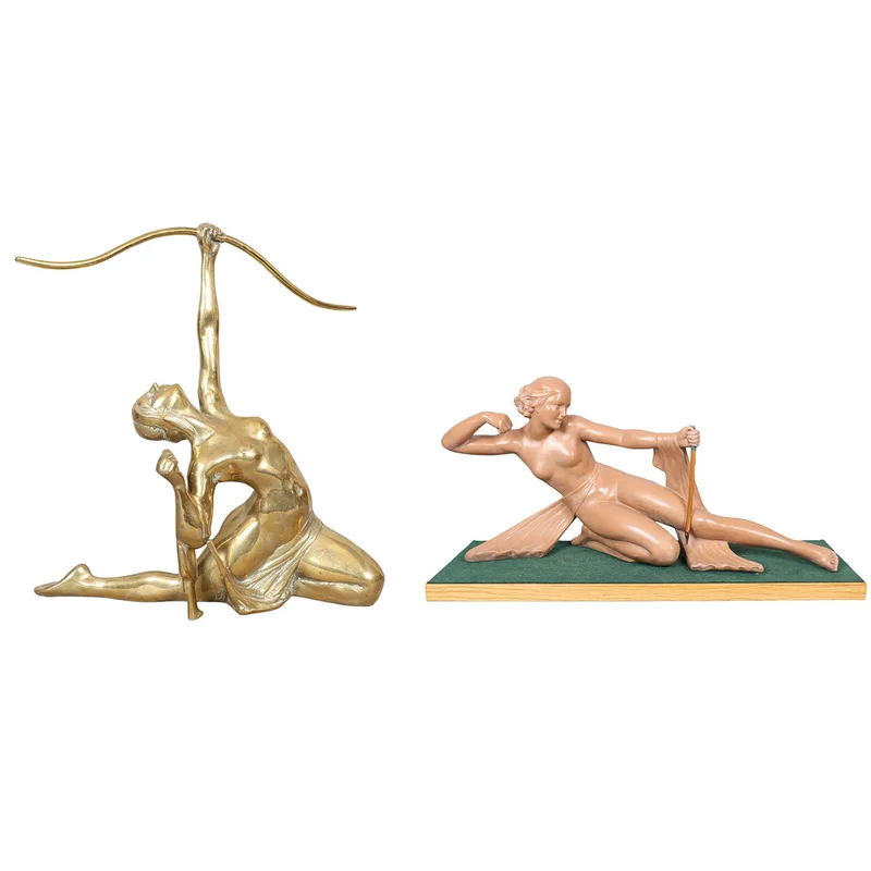 A Large Brass Art Deco Style Archer and a Large Plaster Example (2)