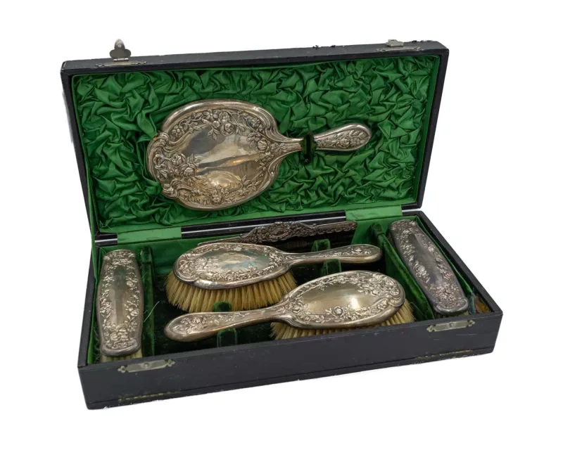 An Edwardian silver dressing table set