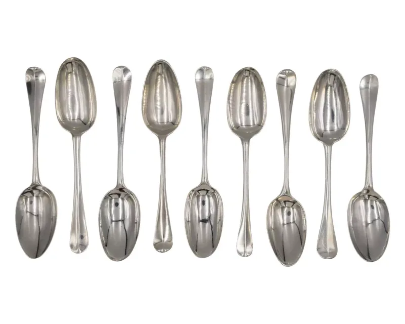 A selection of George II silver Hanoverian pattern tablespoons