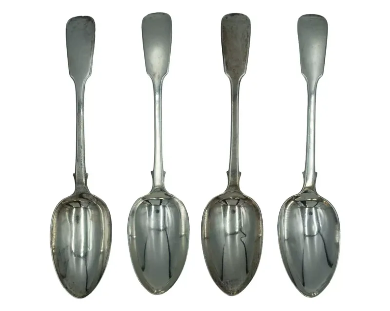 A set of four William IV silver fiddle pattern tablespoons by John