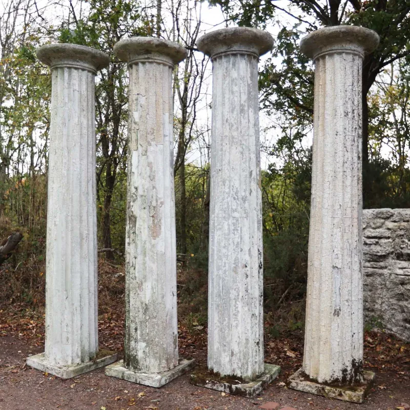 A set of four fibreglass doric columns The columns with turned capitals