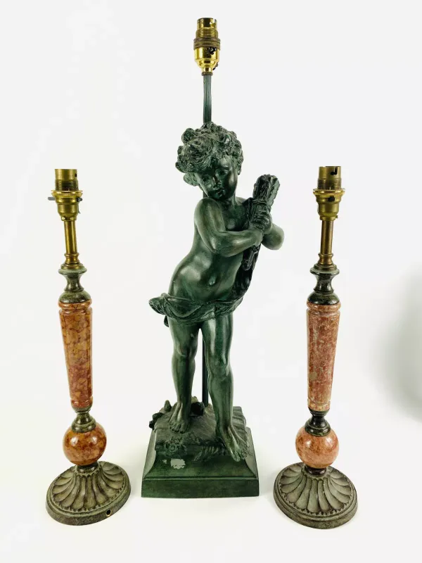 Three items to include an antique style verdigris patinated metal table lamp in the form of an infant