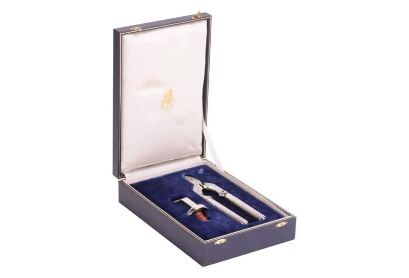 A cased Asprey & Co silver two-piece wine set, comprising a silver mounted bottle stopper, London 1995