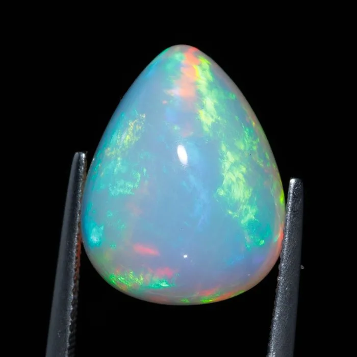 1 pcs Orange Opal - 12.58 ct - International Gemological Institute (IGI) - Play of Color