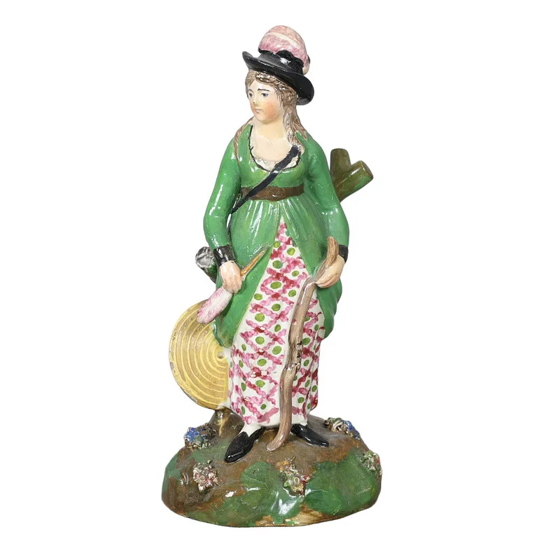An Early 19th Century Staffordshire Pearlware Figure of a Lady Archer