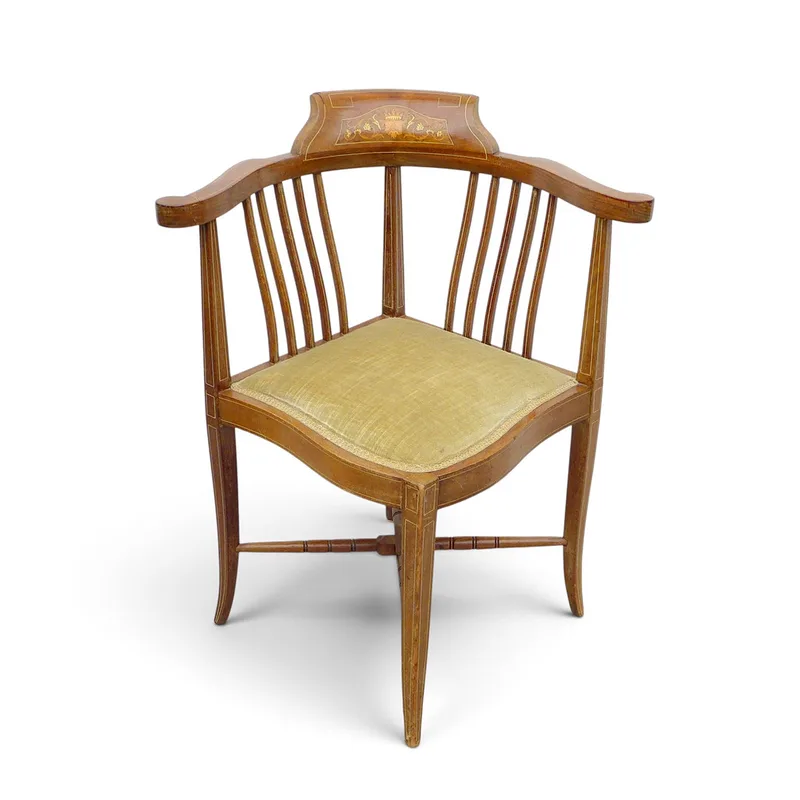 An Edwardian Inlaid Mahogany Comfort Chair