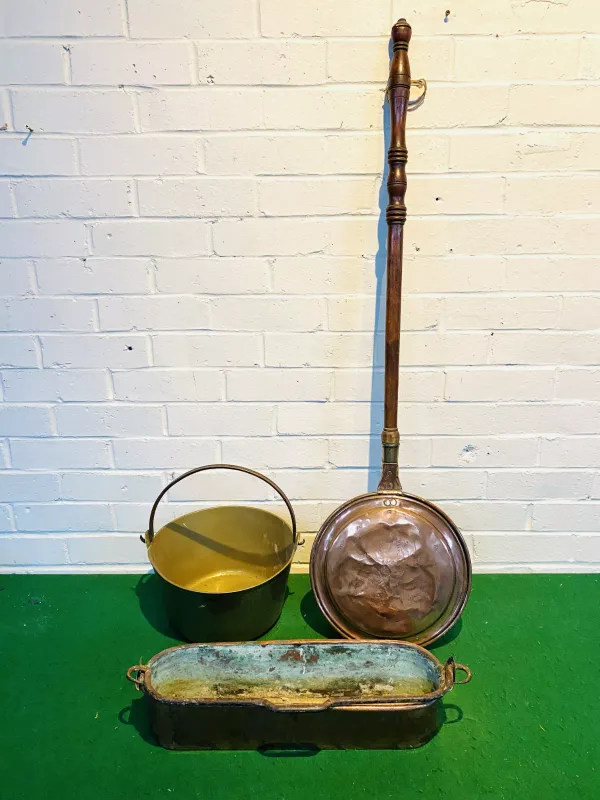 A collection of three items to include a brass jam pan with a steel swing handle, an early copper warming pan